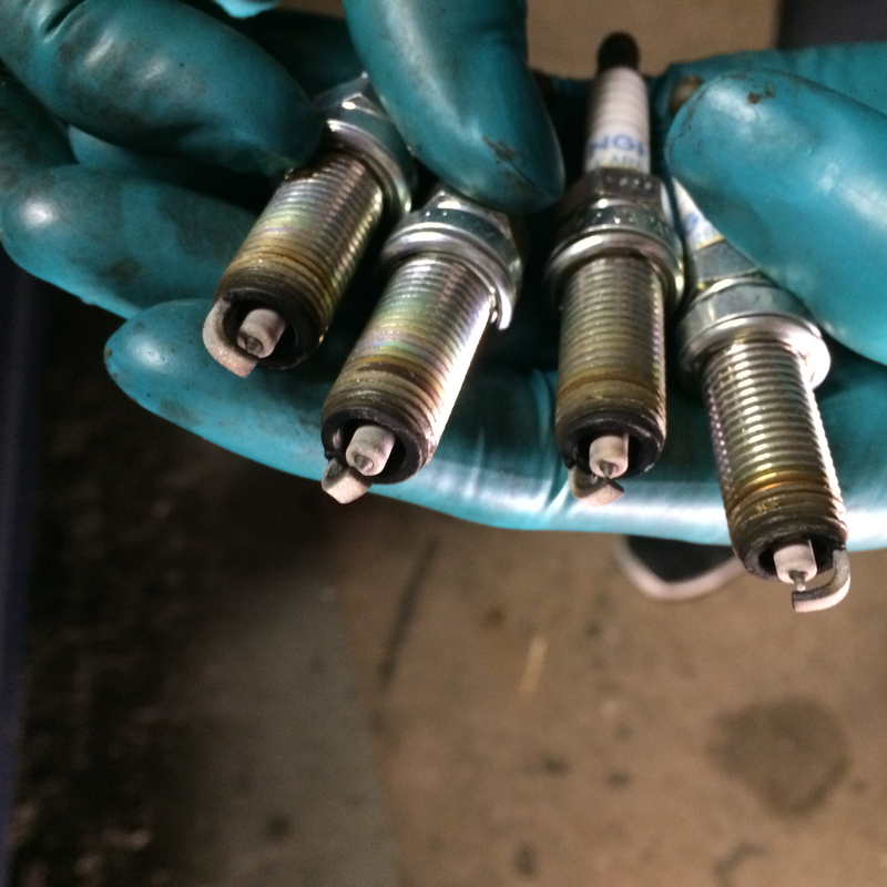 Illustration for article titled Strut Tops and Spark Plugs